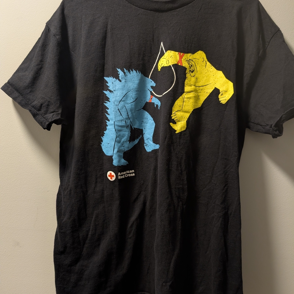 Black Graphic Tee with Blue and Yellow Design